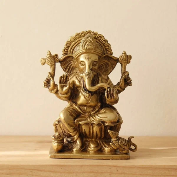 Brass Ganesh idol, 6.5 inch, seated on a lotus with a mouse, front view